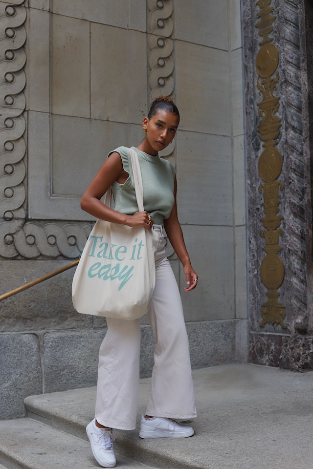 Model holding a bag. Another popular choice